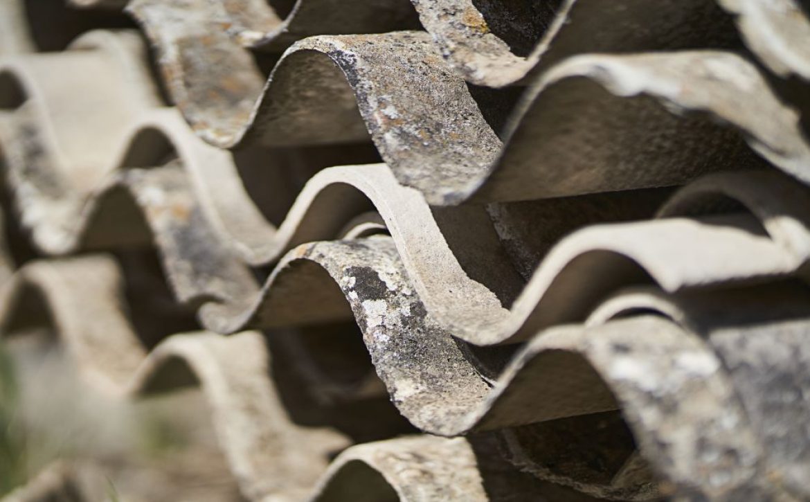 toxic waste with asbestos from piled-up asbestos sheets